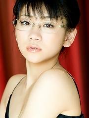 Cute asian hottie seduces in black lingerie and her glasses